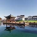 Scenic Waterfront Landscape With Wooden Boardwalk Residential Buildings And Moored Boats