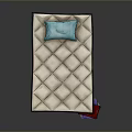 Light diamond quilted mattress with blue pillow and books under transparent box on dark background