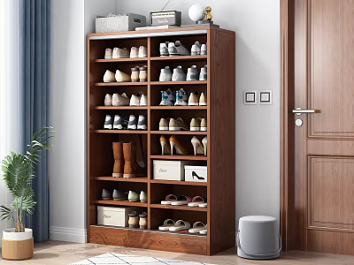Wooden Multi Tiered Shoe Cabinet With Various Shoes And Decorative Items On Top 3d model