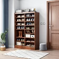 Wooden Multi Tiered Shoe Cabinet With Various Shoes And Decorative Items On Top