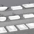 Different Designs of White Washbasins With Faucets on Grey Stone Countertops