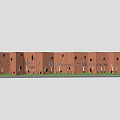 Red Brick Feature Wall Design with Black Decorative Voids and Green Grass Base 3d model