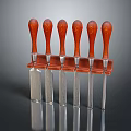 Six Kitchen Knives With Wooden Handles And Metal Blades In Storage Rack