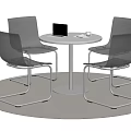 Round Table And Transparent Chairs Set With Laptop Cup On White Top And Round Rug