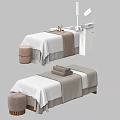 Comfortable Spa Massage Bed With White Sheets Brown Towels Stool And Lamp 3d model