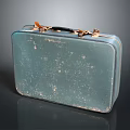 Vintage Blue Green Suitcase With Scratched Surface Gold Fittings And Black Handle
