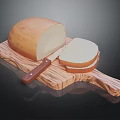 Fresh Loaf of Bread with Sliced Pieces on Wooden Cutting Board and Knife