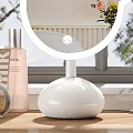 Cute Bear Shaped LED Lighted Mirror with White Base on Vanity Table with Cosmetics 3d model