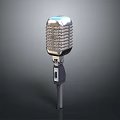 Vintage Silver Microphone with Retro Mesh Grille and Black Base 3d model