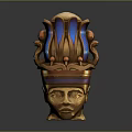 Intricate Golden Head Sculpture With Crown Like Structure And Blue Snake Ornaments