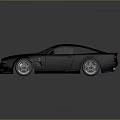 Gray Two Door Sports Car With Custom Wheels Red Front Lip And Sleek Lines