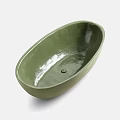 Green Oval Bathtub With Smooth Glossy Surface And Simple Design