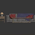 Gray Sofa With Red Pillows Blue Blanket And Wooden Coffee Table Side Table With Lamp