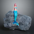 Beautiful Mythical Mermaid With Red Hair And Blue Tail Standing On Gray Rock
