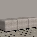 Light Beige Upholstered Stool with Vertical Tufted Design and Gold Metal Legs on Patterned Rug