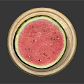 Sliced Watermelon With Red Flesh Black Seeds Green Rind On Wooden Plate Gray Background