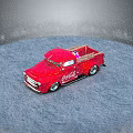 Red Vintage Coca-Cola Truck Model With Gifts In Bed On Snowy Surface With Snowflakes