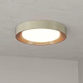Round Ceiling Light With Golden Lampshade White Light And Orange Stripes Mounted On Gray Ceiling