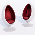 Two Egg Shaped Lounge Chairs With White Outer Shell And Red Cushions On Round Base 3d model