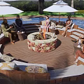 Rural Landscape Riverside Wooden Deck With Stone Fire Pit Cozy Sofas And Large Umbrellas