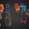 Various Colored Stacked Metal Barrels With Blue Red Green And White Hues
