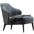 Modern Single Sofa With Gray Fabric Armrest And Draped Blanket On Dark Legs