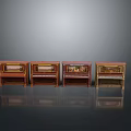 Four Vintage Pianos in Different Colors Arranged Side by Side on Reflective Floor