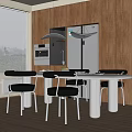 Modern Dining Table Set With Black Chairs Wooden Walls Pendant Lights And Kitchen Appliances