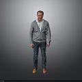 Man Standing In Gray Background Wearing Gray Cardigan White Shirt Blue Jeans And Brown Shoes