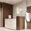 Bright Modern Light Luxury Clothing Store Interior With Elegant Garment Display And Marble Reception Counter