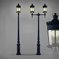 Traditional Outdoor Lights With Decorative Lamp Posts And Glass Shades