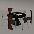 Modern Round Dining Table With Black Top And Mixed Chairs Featuring Fruits And Open Book