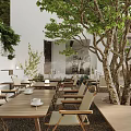 Garden Landscape Design Featuring Outdoor Courtyard Green Trees Wooden Tables Chairs White Walls and Awning