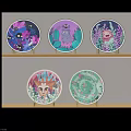 Colorful Decorative Plates With Unique Designs Displayed On Wooden Wall Shelves