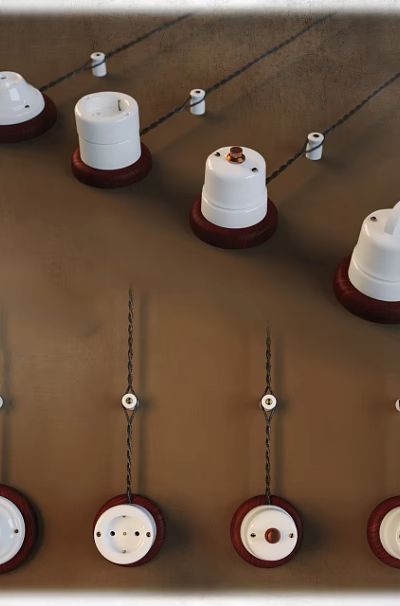 White Switch Panels With Red Bases Arranged On Brown Wall For Home Decoration 3d model