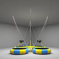 Indoor Circular Trampolines As Sports Equipment With Yellow Blue Design And White Hanging Ropes
