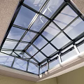 Outdoor Modern Glass Roof Sunroom With Black Frame And Grass Surroundings