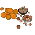 Fresh Oranges Walnuts And Chocolate Truffles On White Display Platters