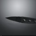 Sharp Folding Knife With Two Circular Holes On Handle And Metal Reflective Surface