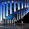 Futuristic Tech Display Space With Circular Structure Blue Pillars Large Screen And Woman Operating