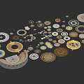 Assorted Decorative Circular Disc Components With Golden Brown Gray Textures And Ornamental Patterns 3d model