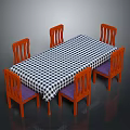 Rectangular Dining Table With Black White Checkered Cloth And Orange Wooden Chairs
