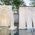Outdoor Ceiling Drapery Setup In Garden Near Pool And Trees