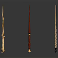 Three Decorative Wand Sculptures With Intricate Carvings And Detailed Designs