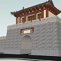 Traditional Chinese City Gate Tower With Gray Brick Walls And Arched Gateway