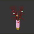 Sculptural Carving of Light Colored Cylindrical Vase with Branches and Red Pink Heart Decorations on Dark Background