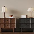 Wooden and Black Bedside Tables With White Lampshades And Decor Items