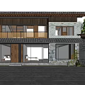 Two Story Guesthouse Building With Wooden Stone Exterior Large Windows And Warm Night Lighting