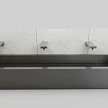 Sleek Modern Washbasin With Black Countertop Three Faucets And Light Marble Backsplash