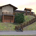 Rural Self-built House With Black Roof Stone Pavement And Curved Road Green Trees Wooden Fence